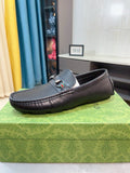 Gucci Perforated Metal Hardware Loafers — front