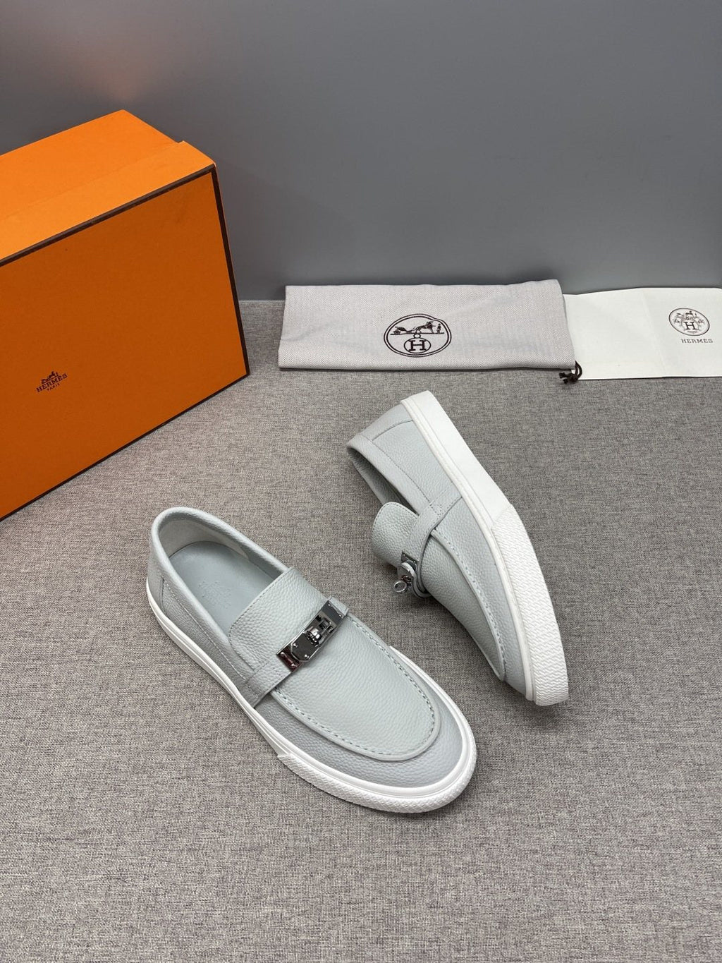 Hermès Textured Bar Loafers — side
