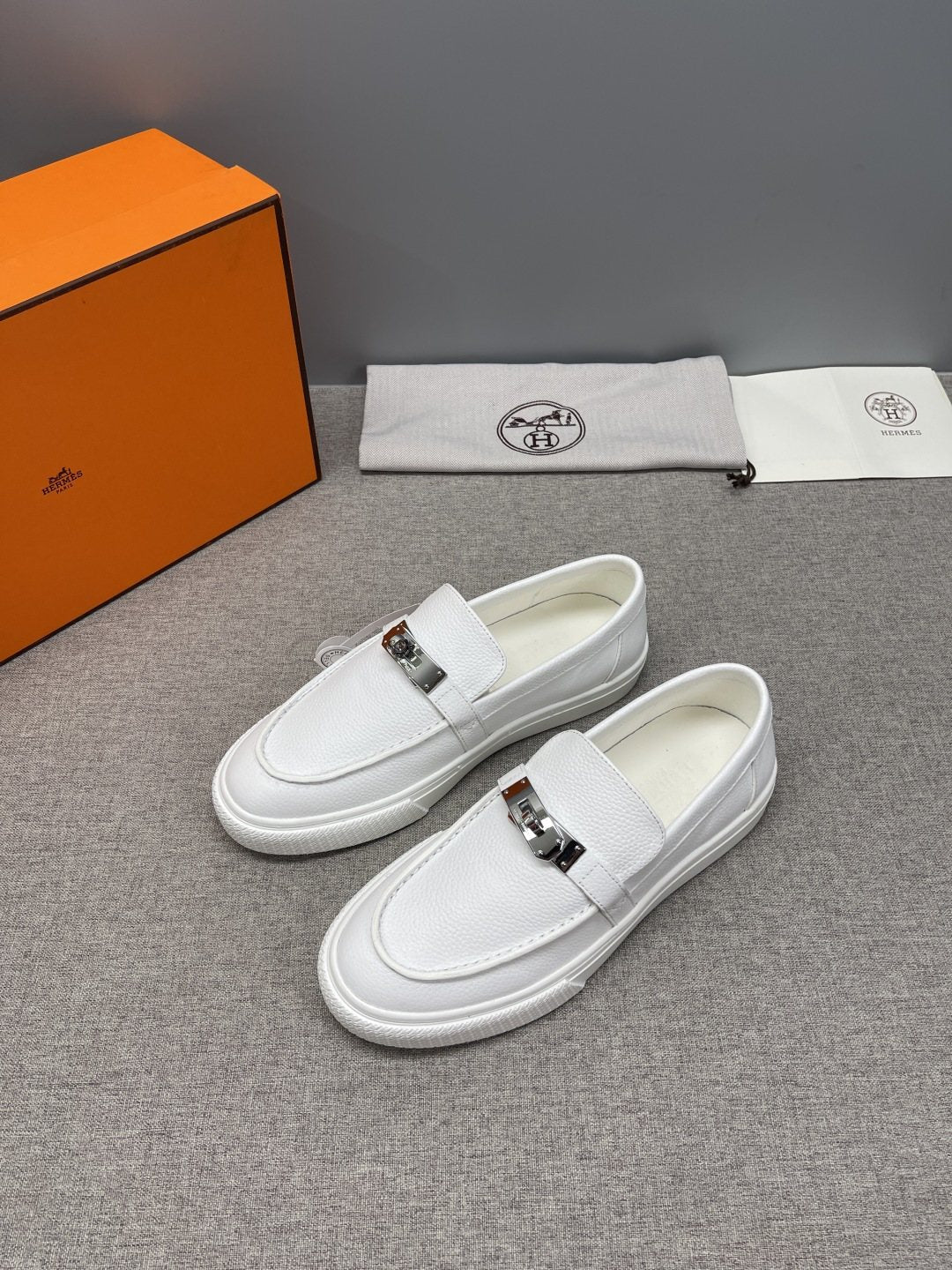 Hermès Textured Bar Loafers — front