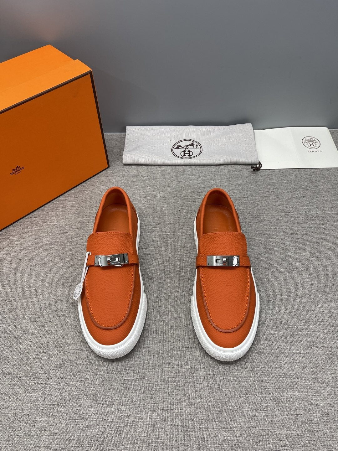 Hermès Textured Bar Loafers — front