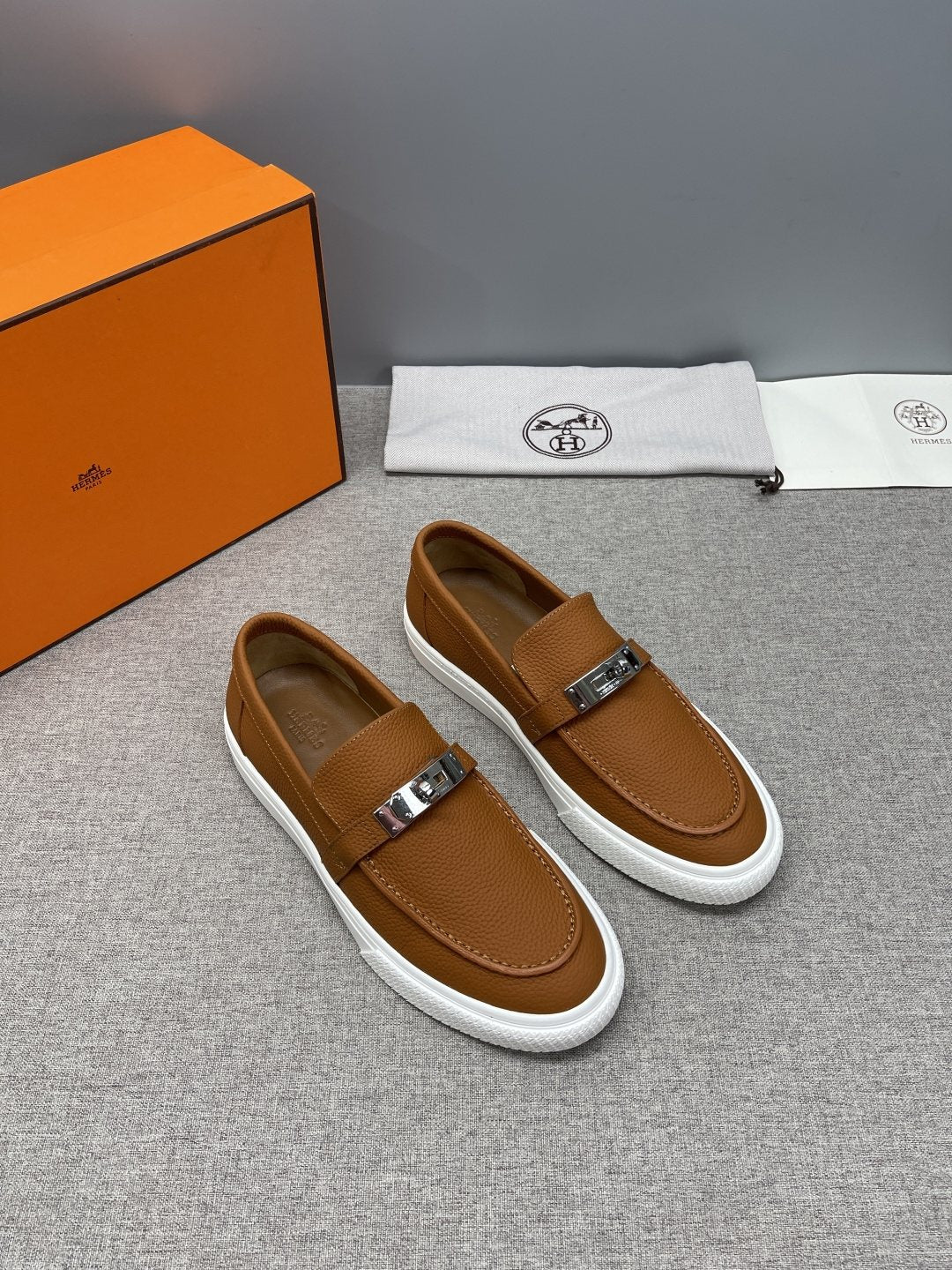 Hermès Textured Bar Loafers — front