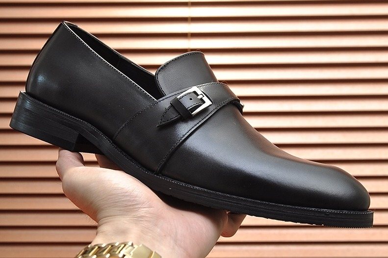 Hermès Black Buckle Loafers — hero