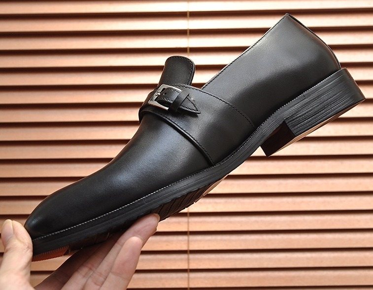 Hermès Black Buckle Loafers — front