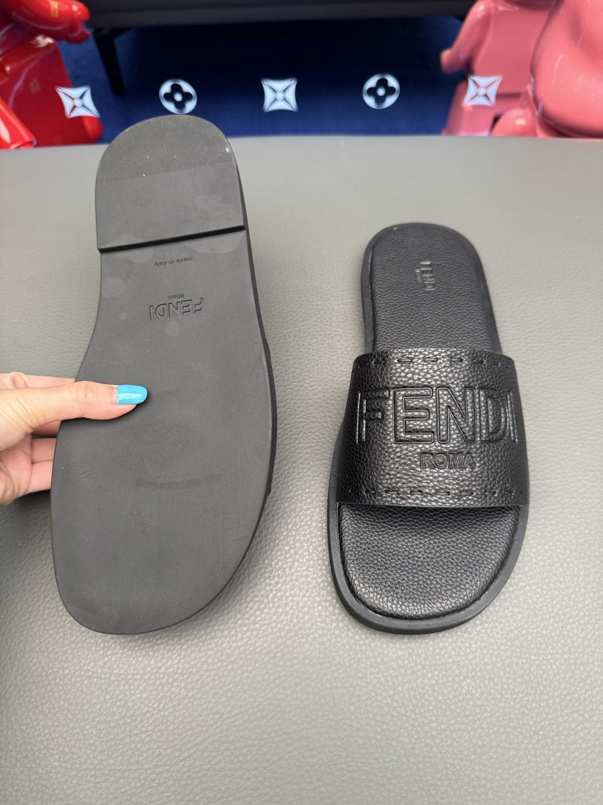 Fendi Embossed Logo Slide Sandals — side