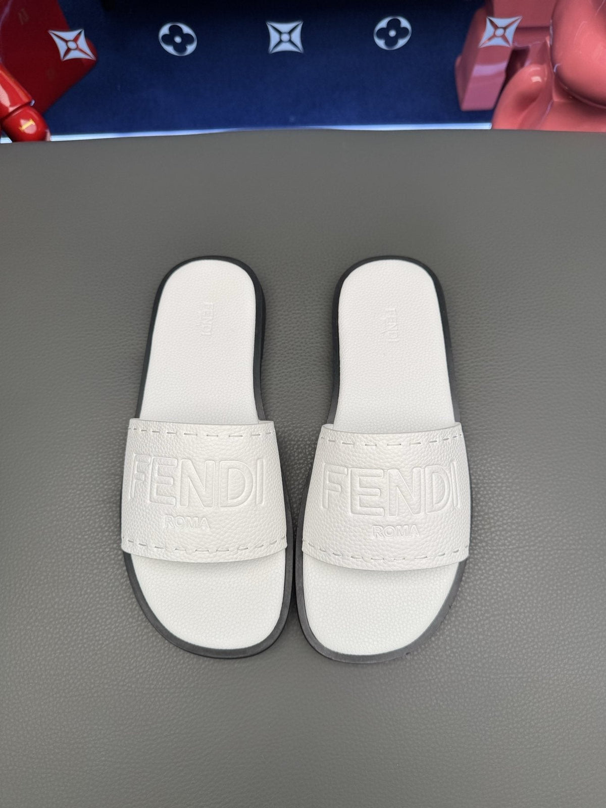 Fendi Embossed Logo Slide Sandals — front