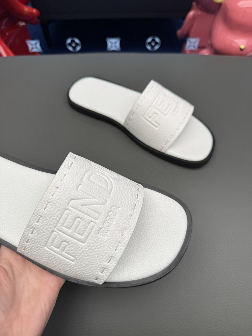 Fendi Embossed Logo Slide Sandals — front