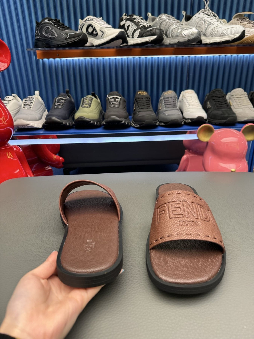 Fendi Embossed Logo Slide Sandals — side
