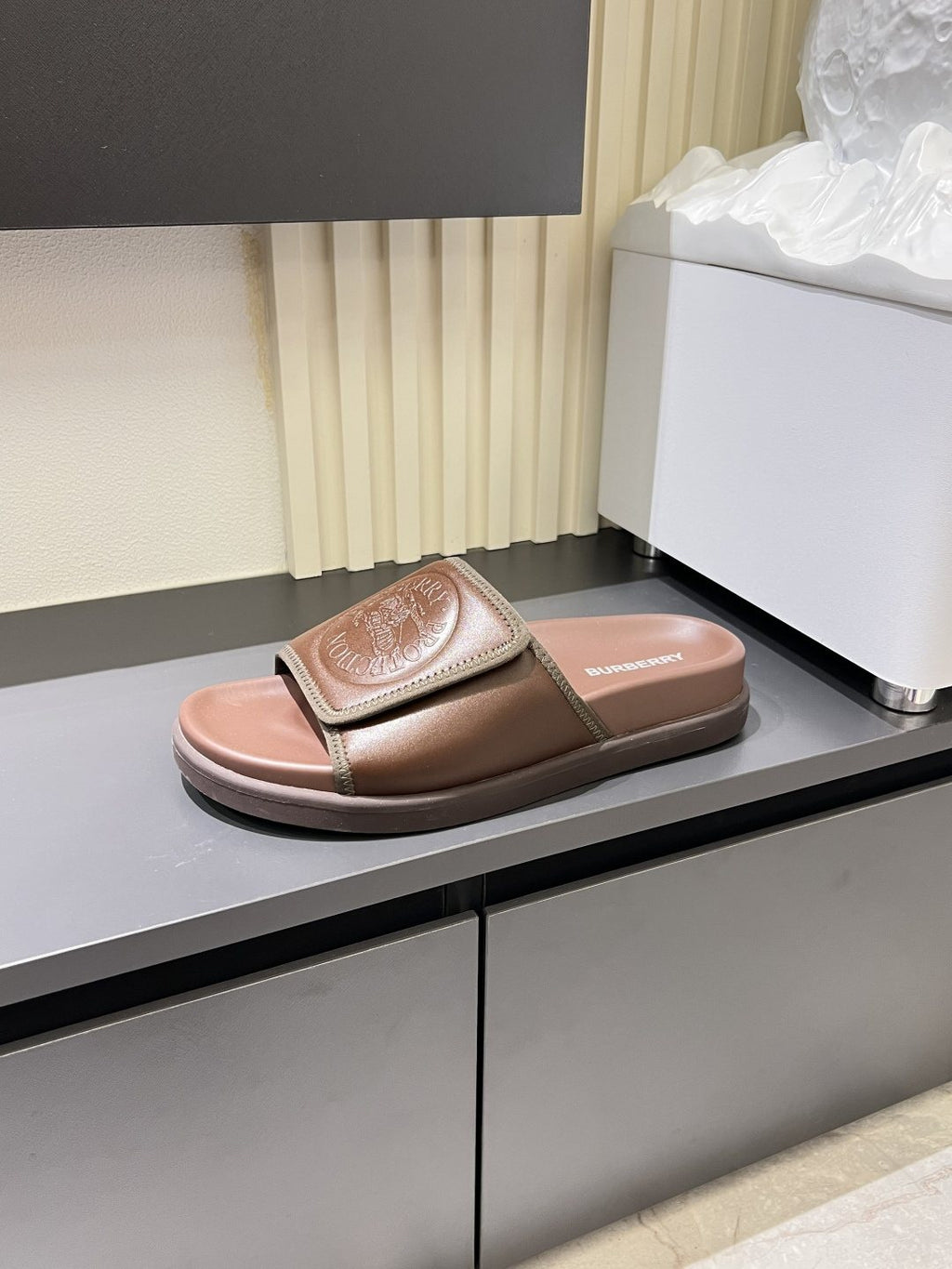 Burberry Embossed Check Slide Sandals — model