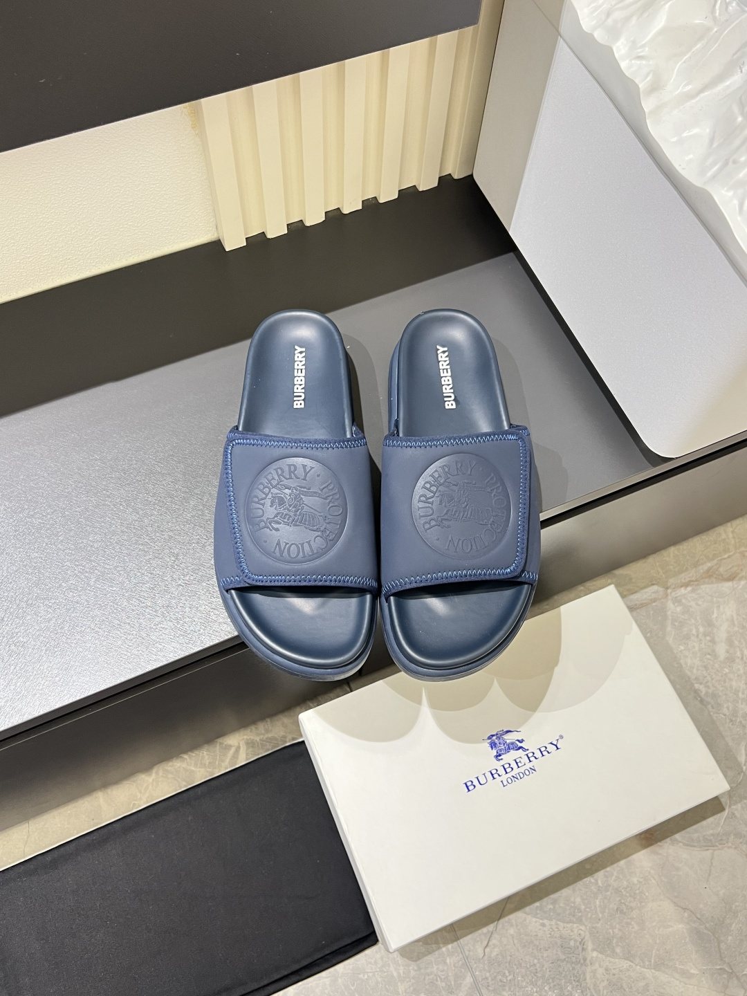 Burberry Embossed Check Slide Sandals — hero