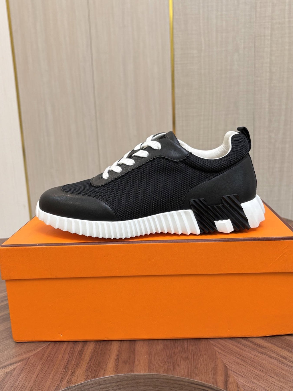 Hermes Black Ribbed Sole Sneakers — side