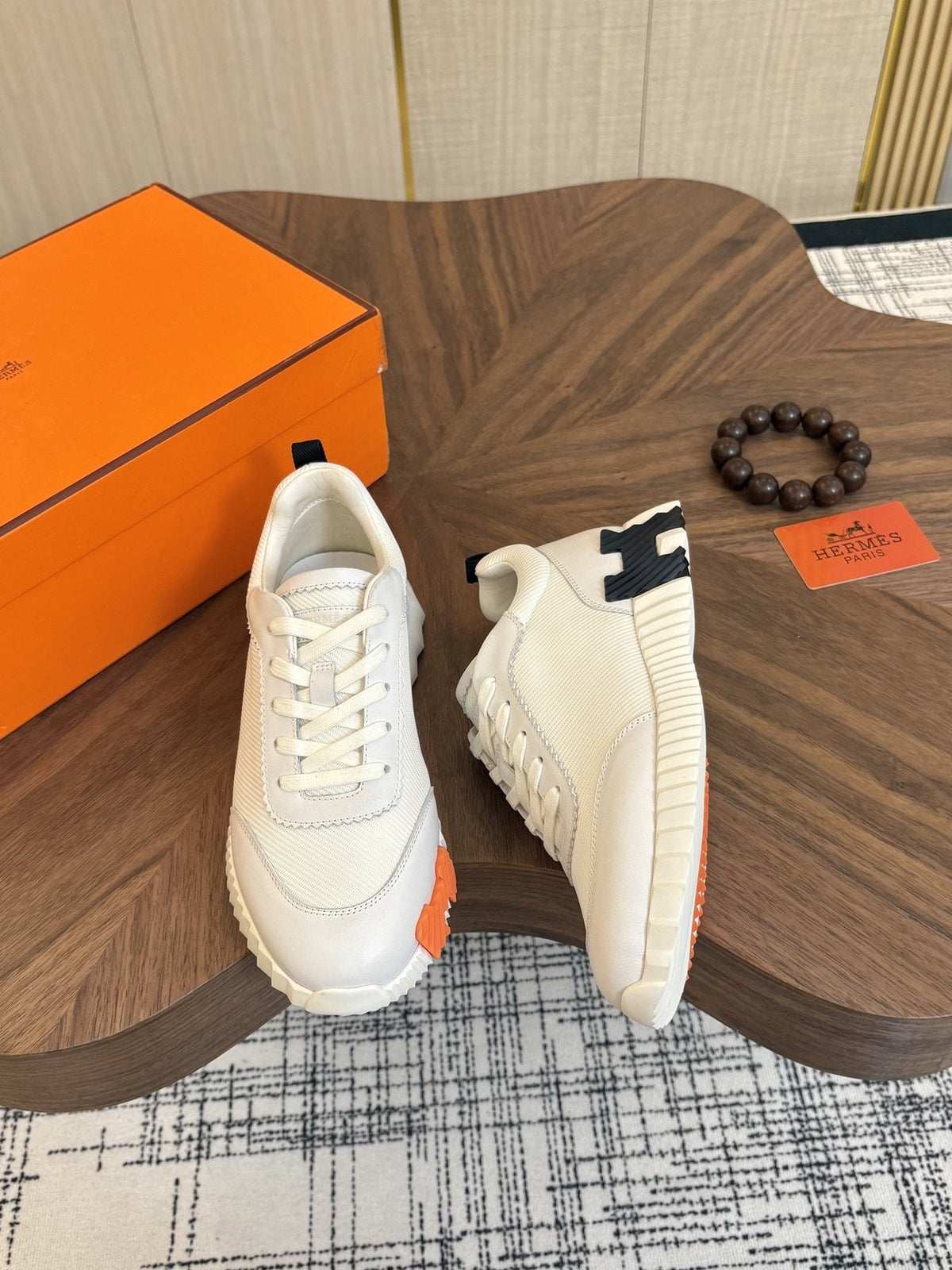 Hermes Black Ribbed Sole Sneakers — front