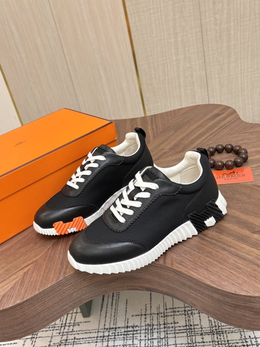 Hermes Black Ribbed Sole Sneakers — front