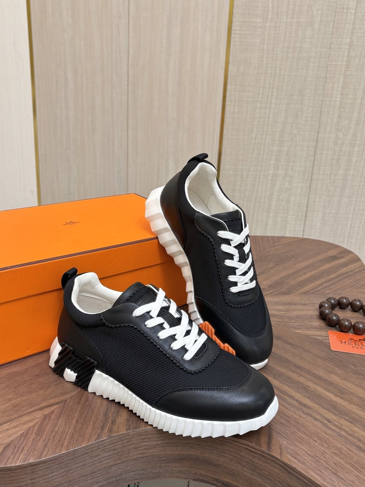 Hermes Black Ribbed Sole Sneakers — hero