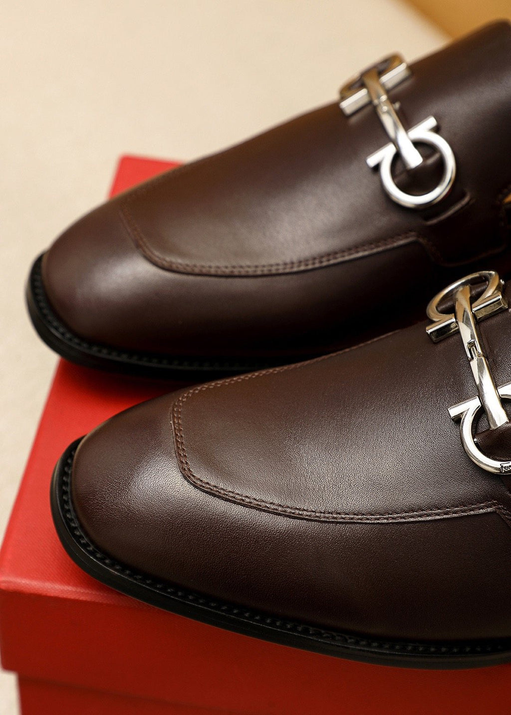 Ferragamo Silver-Tone Ornament Loafers — detail