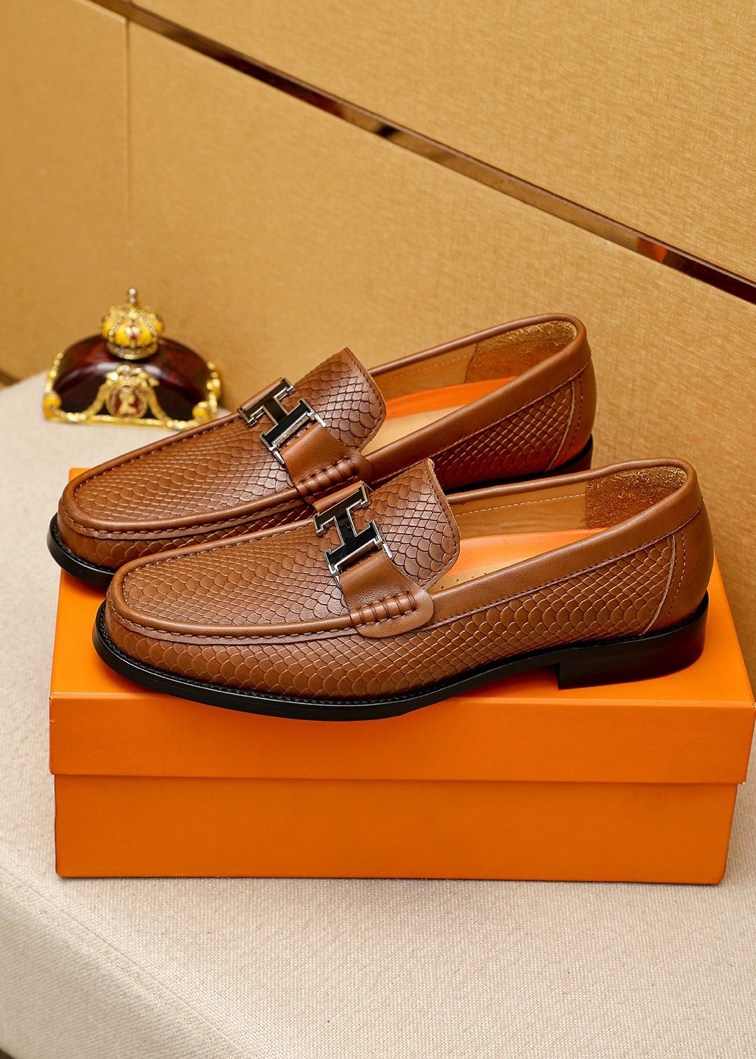 Hermès Textured Hardware Loafers — front