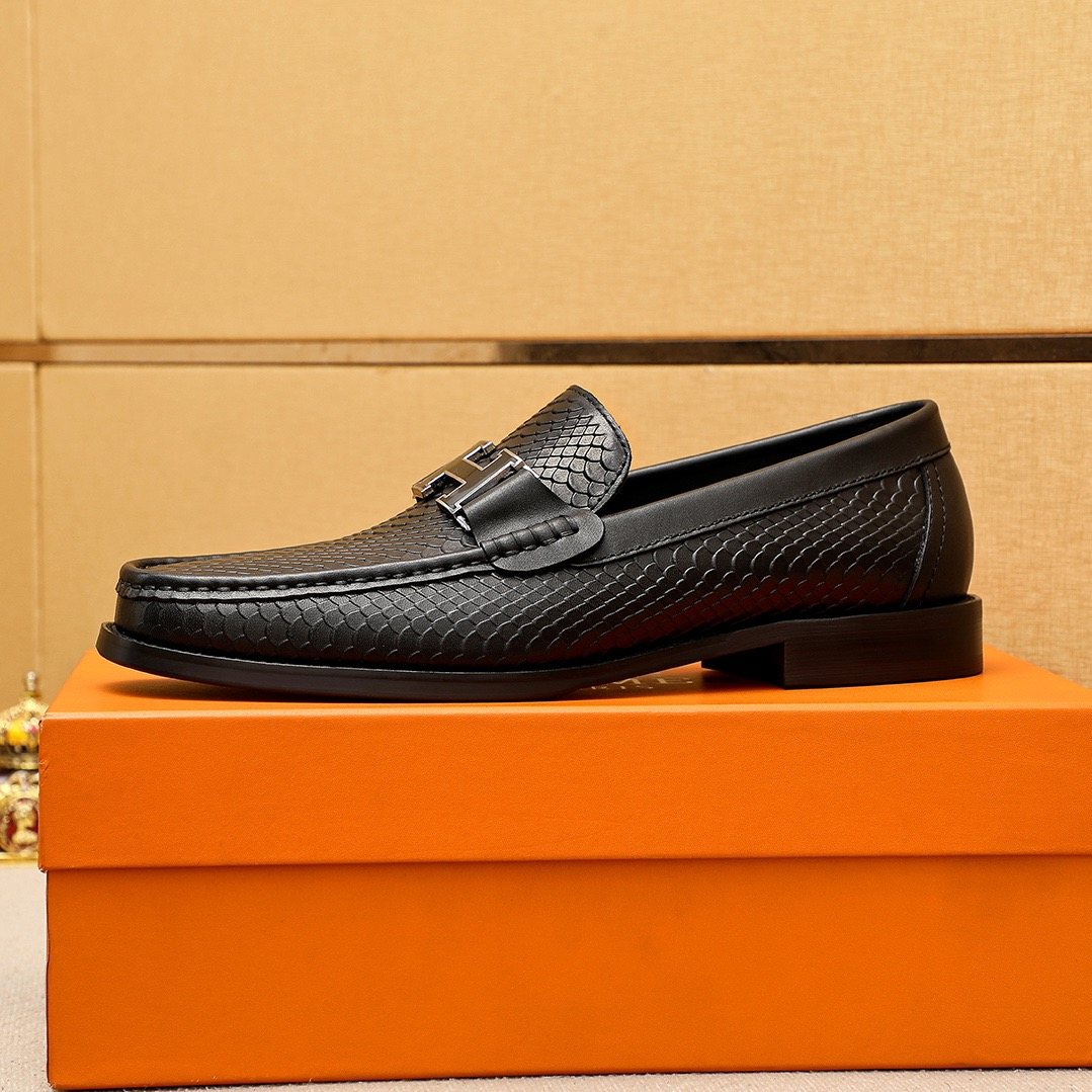 Hermès Textured Hardware Loafers — side