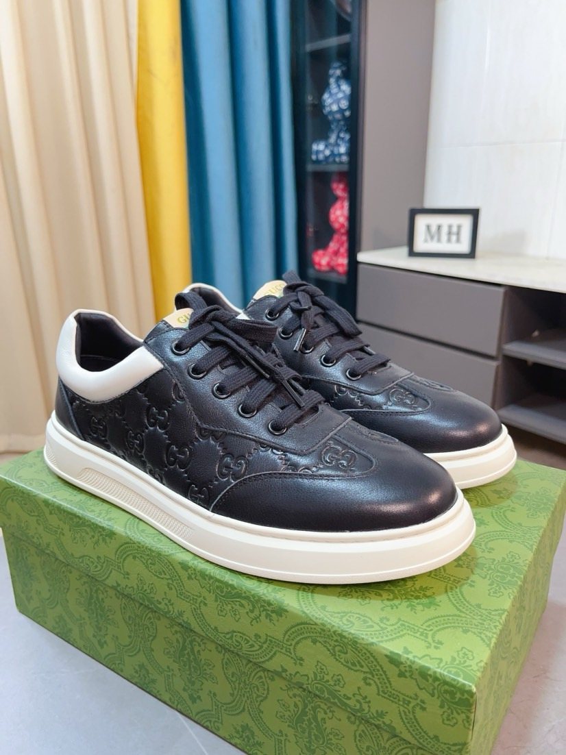 Gucci Embossed Low-Top Sneakers — hero