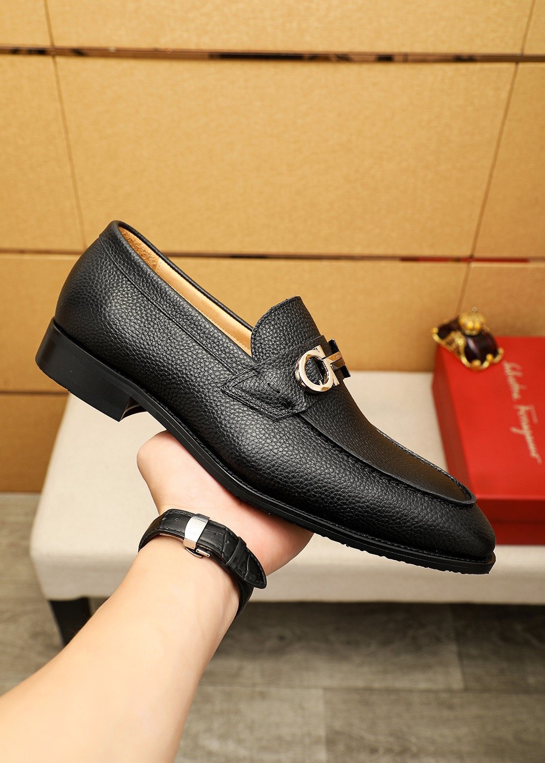 Ferragamo Pebble Leather Buckle Loafers — model