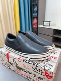 Dolce & Gabbana Striped Sole Slip-On Shoes — hero
