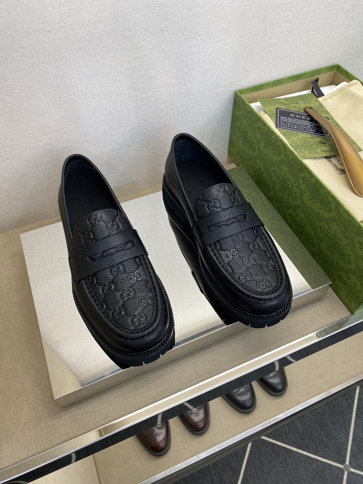 Gucci Black Embossed Lug Sole Loafers — hero