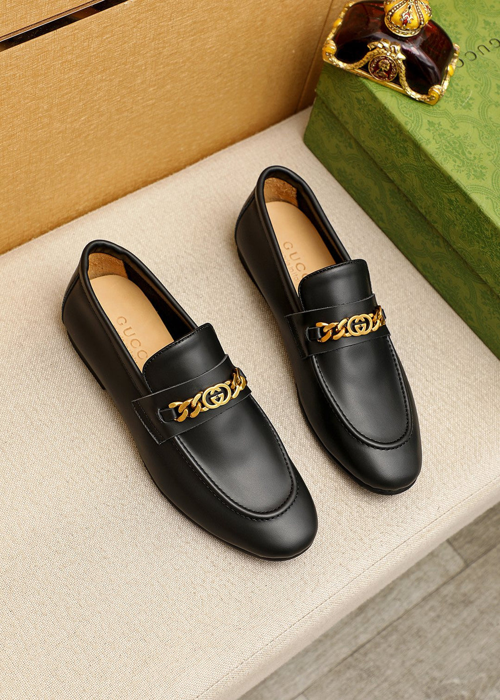 Gucci Leather Chain Loafers — front