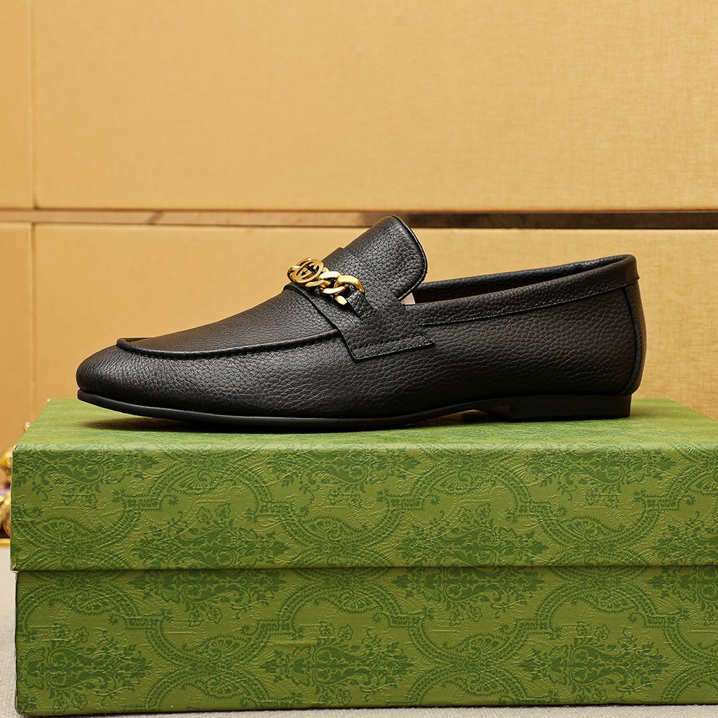 Gucci Pebble Leather Loafers — side