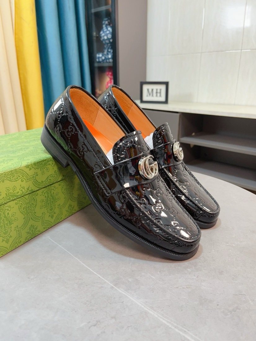 Gucci Embossed Metal-Hardware Loafers — front