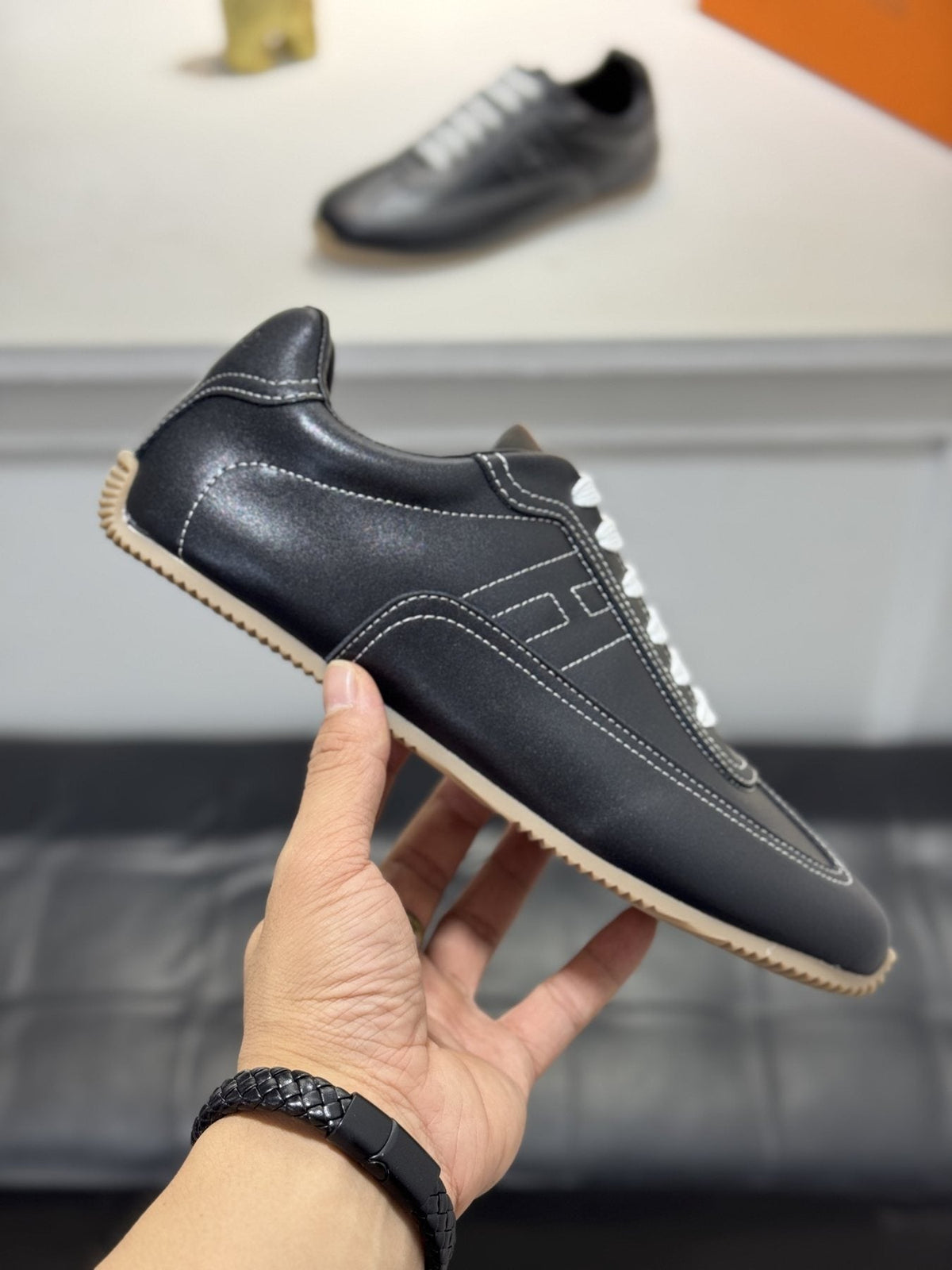 Hermès Contrast-Trim Low-Top Sneakers — side