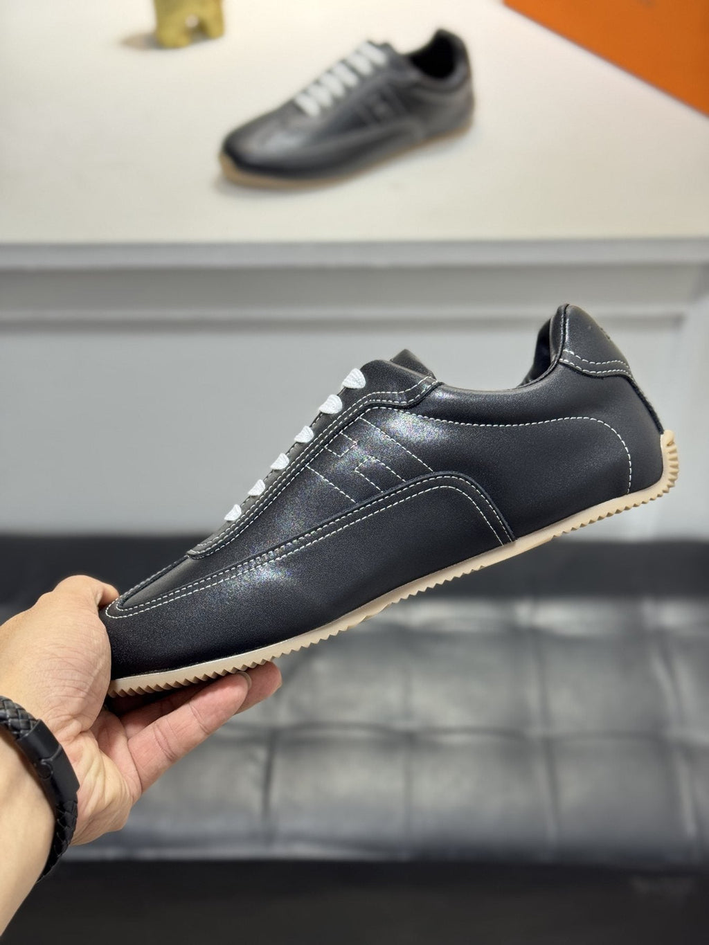 Hermès Contrast-Trim Low-Top Sneakers — side