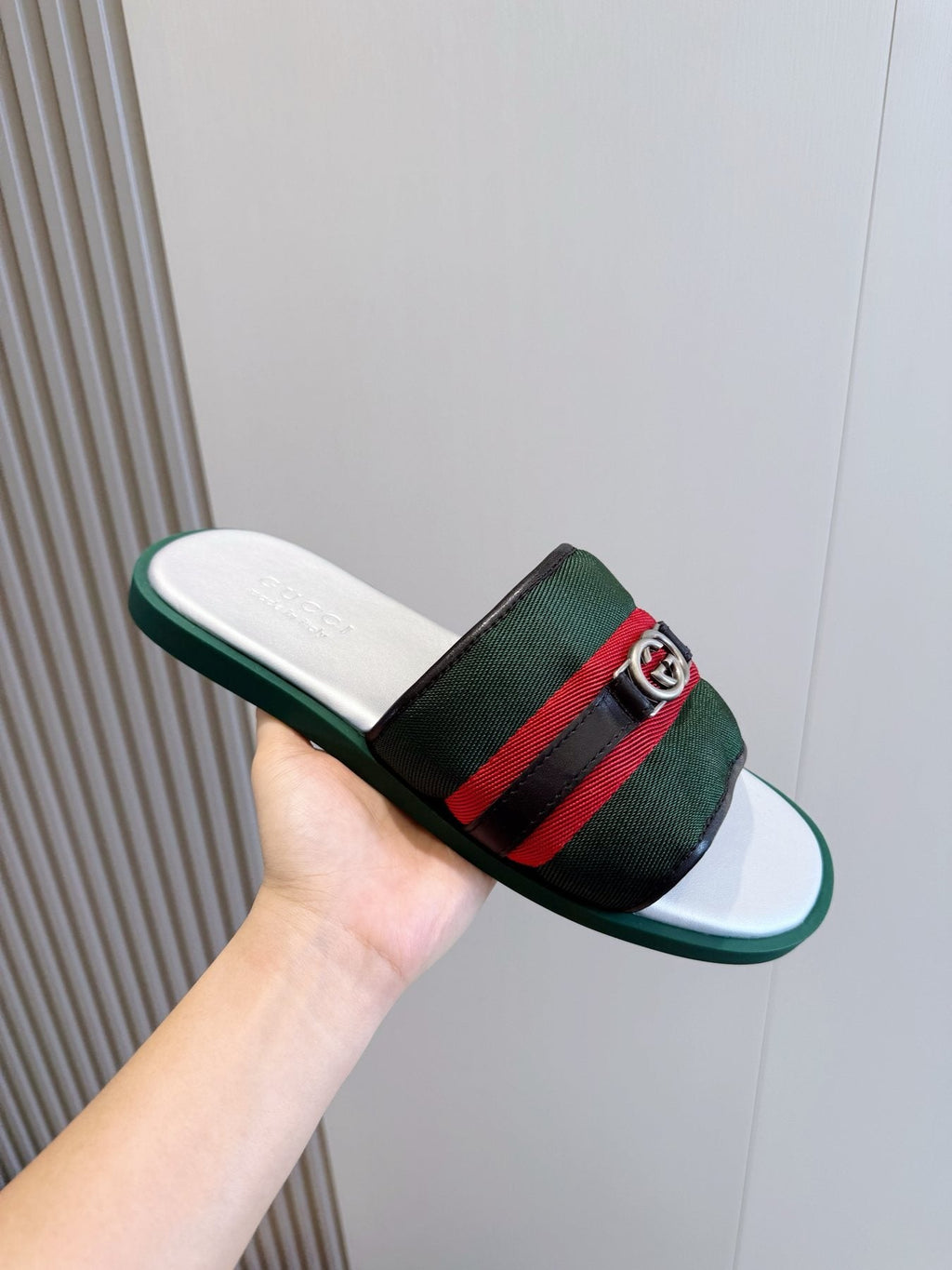 Gucci Interlocking G Stripe Slide Sandals — model