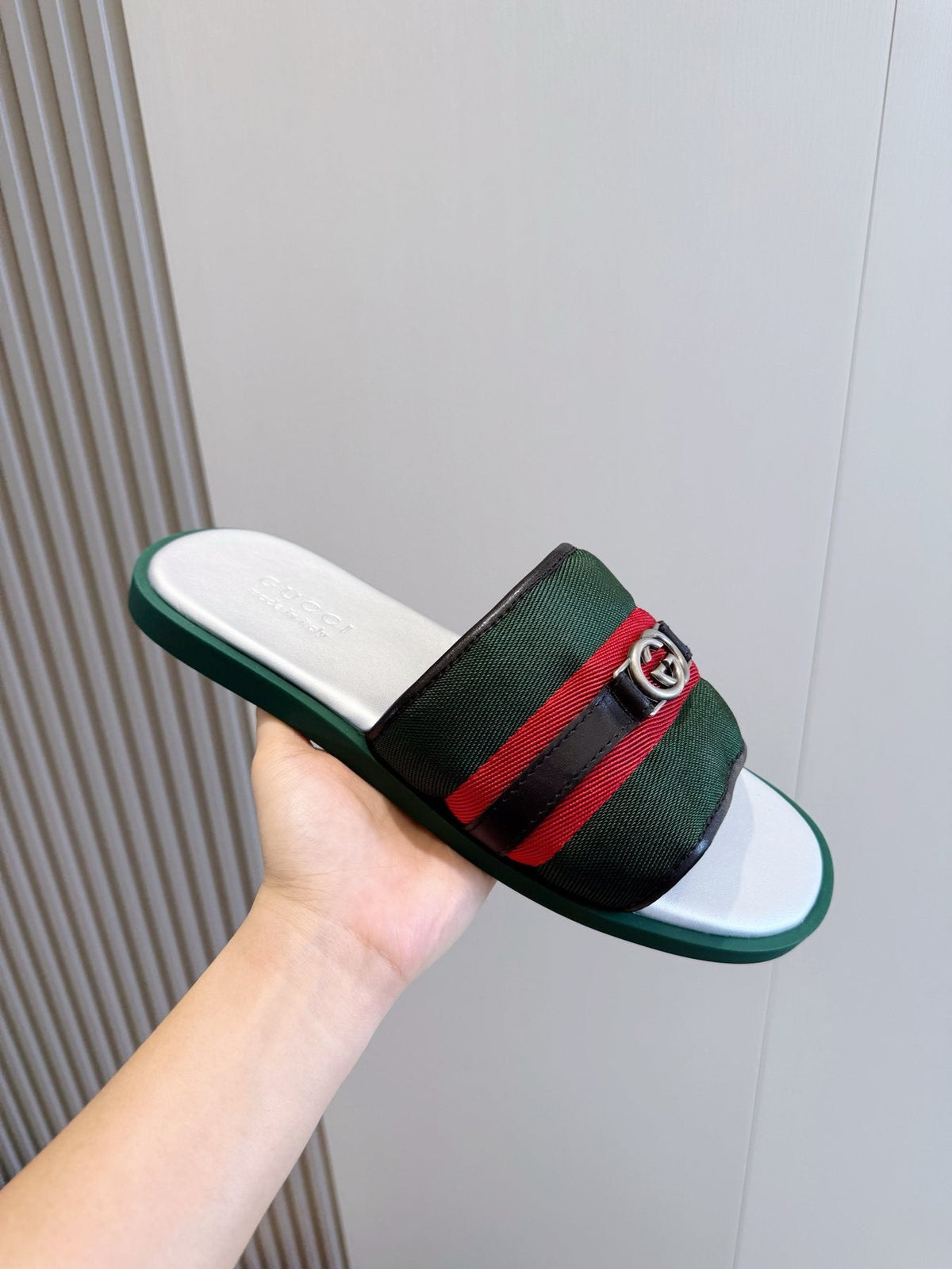 Gucci Interlocking G Stripe Slide Sandals — model