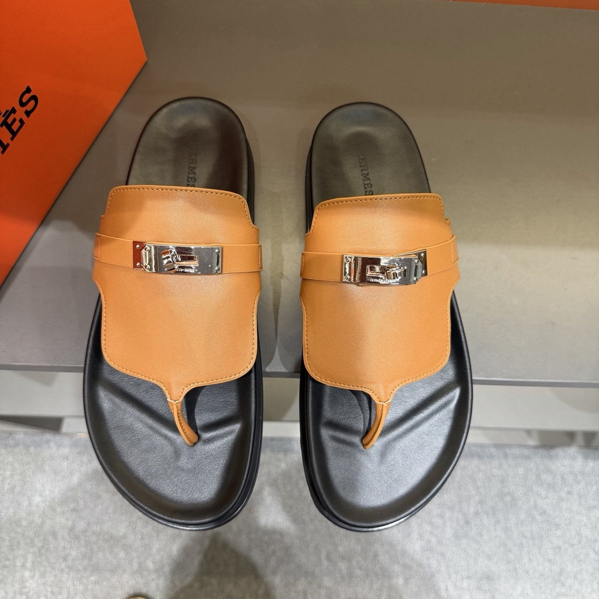 Hermès Metal-Hardware Thong Sandals — front