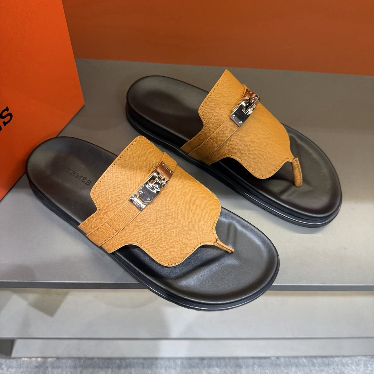 Hermès Metal-Hardware Thong Sandals — front