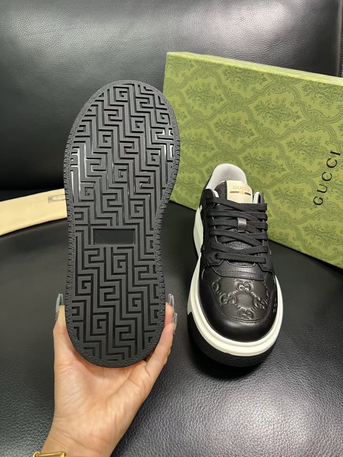 Gucci Embossed Low-Top Sneakers — detail