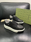Gucci Embossed Low-Top Sneakers — hero