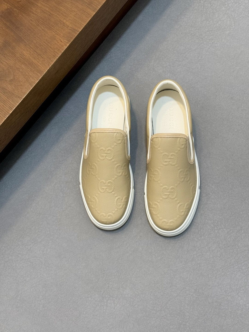 Gucci Embossed Slip-On Sneakers — front