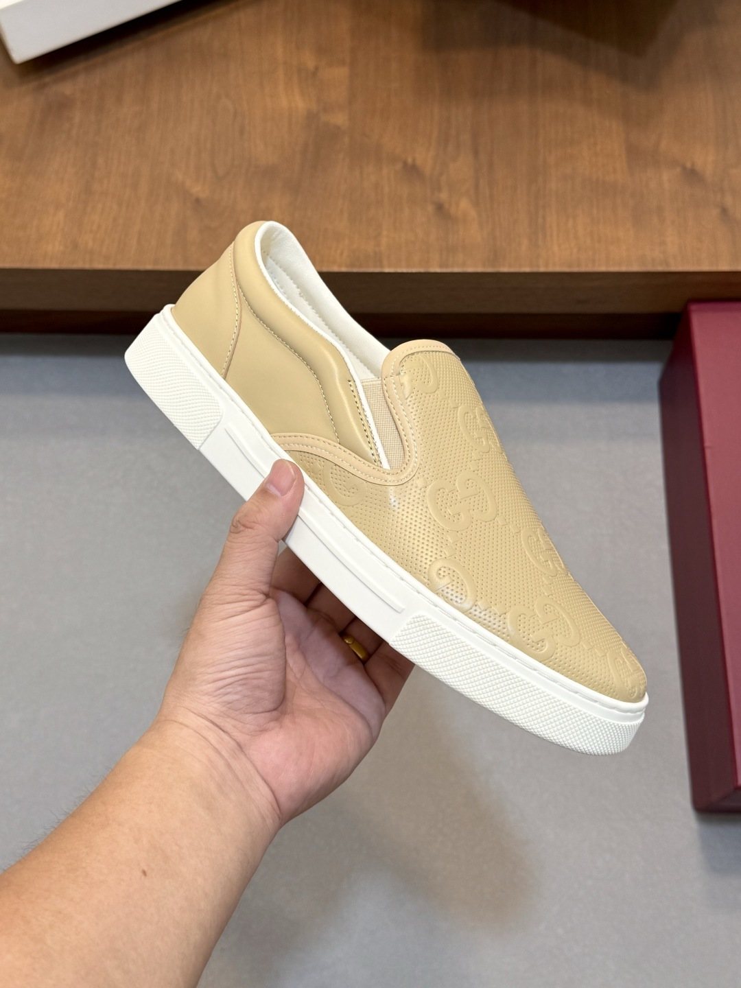 Gucci Embossed Slip-On Sneakers — model