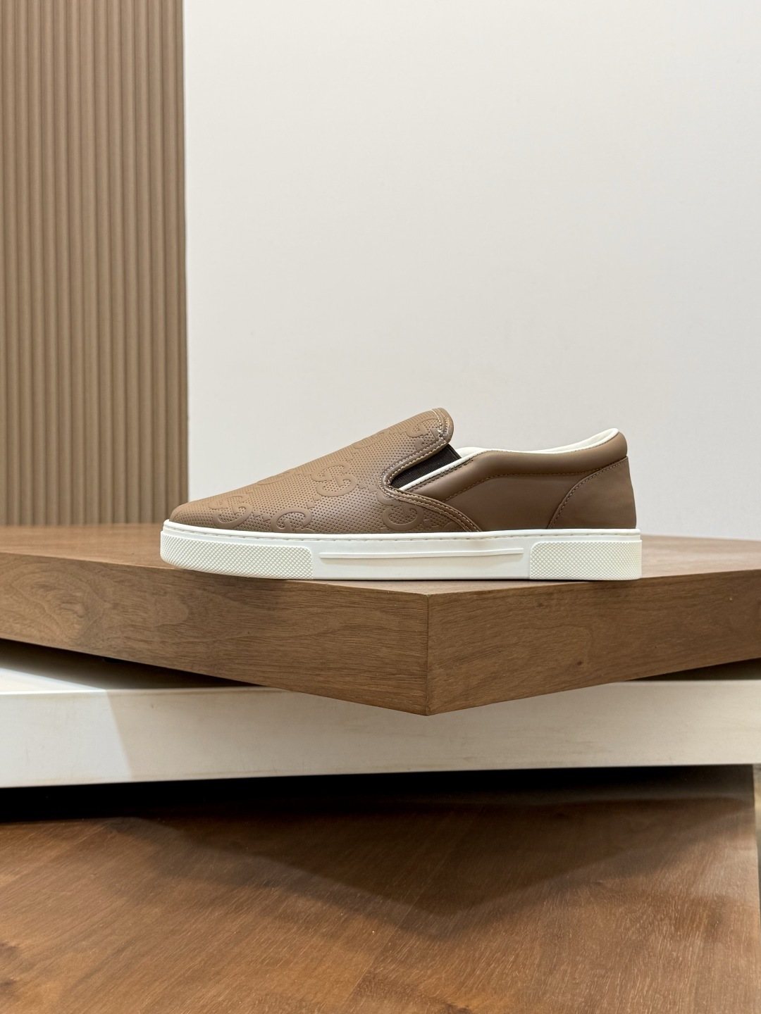 Gucci Embossed Slip-On Sneakers — side