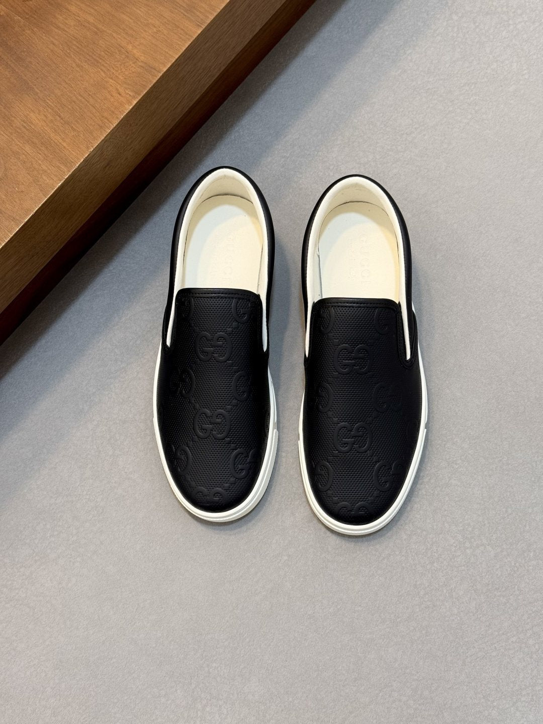 Gucci Embossed Slip-On Sneakers — front