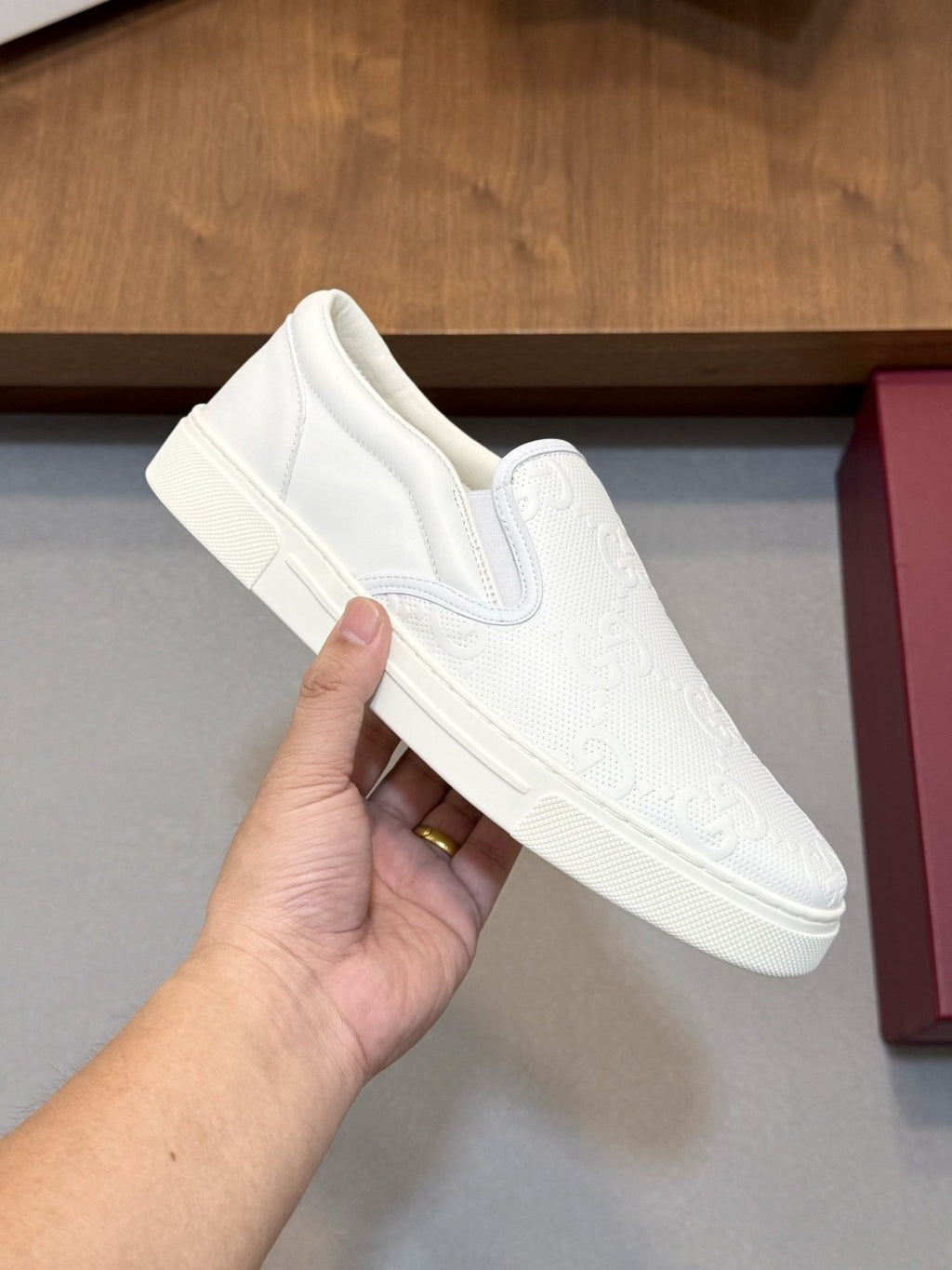 Gucci Embossed Slip-On Sneakers — model