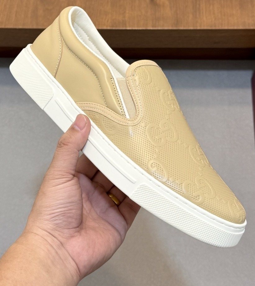 Gucci Embossed Slip-On Sneakers — front