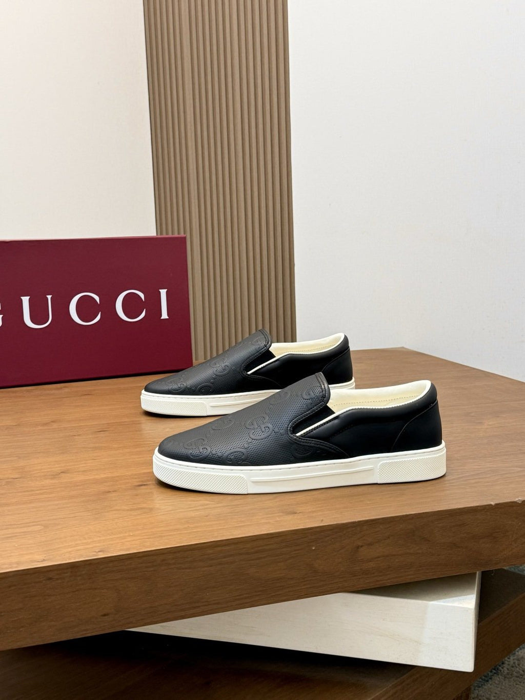 Gucci Embossed Slip-On Sneakers — front